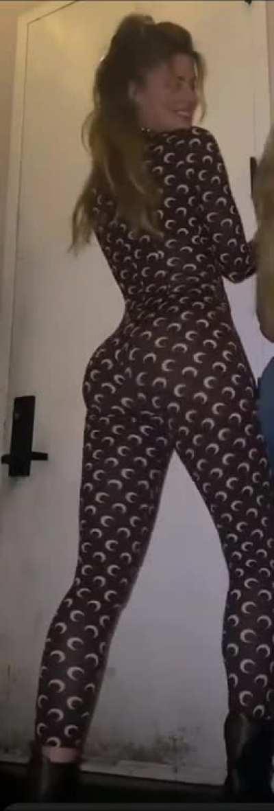 Shaking her fat ass in body suit