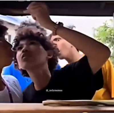 Look at the guy in the yellow shirt