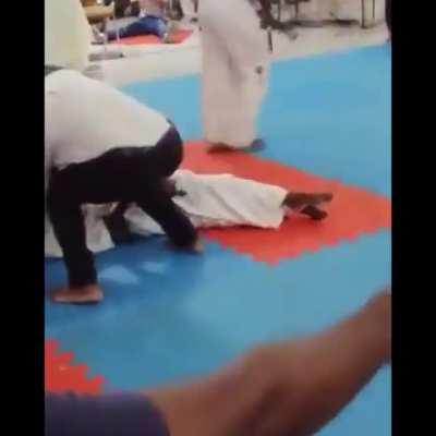 Not sure if this is Karate or TKD but either way it's a beautiful KO. Homie's soul left his body.