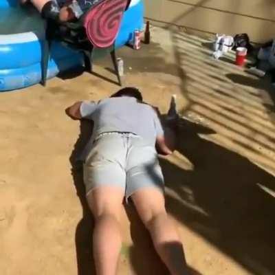 This video has in it a blond hair girl wearing white shorts and a skimpy top.