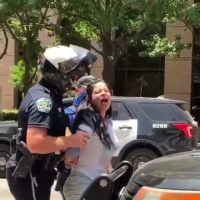 [Request] the last few seconds to show what the police officer is doing with his hands.