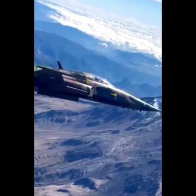 F-5 Tiger ll over the Pico de Orizaba volcano