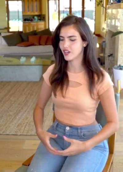 Tight jeans and midriff!