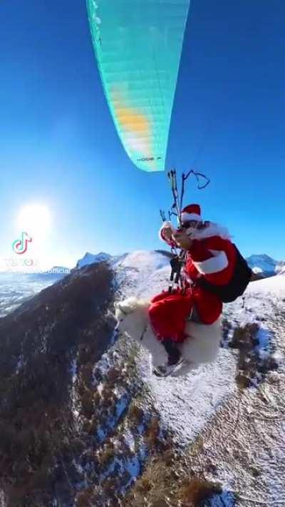 Santa rides his fluffy reindog through the mountains