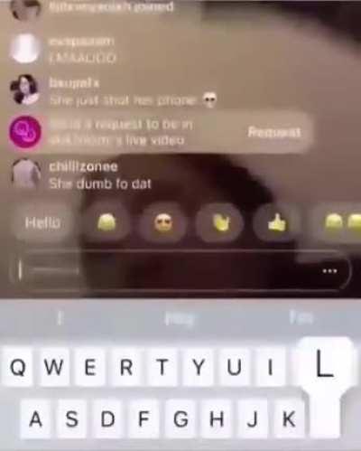 Girl shoots her phone.