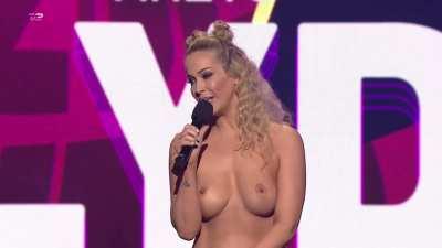 Danish television presenter Ibi Makienok completely naked for the roaring crowd