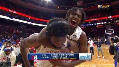 [Highlight] An excited Tyrese Maxey jumps on Embiid’s back during the post game interview, Embiid says “I missed too many free throws like you” to him