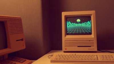 Thought you might appreciate the outrun-styled visualisation I programmed on my vintage Mac