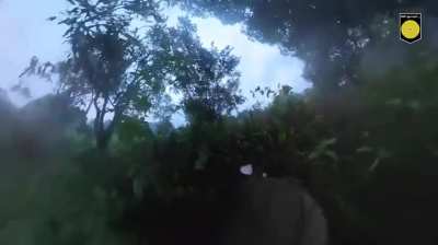 Fighters of the Karenni Nationalities Defense Force 2nd Strategic Operations Command attacking a Myanmar Army base camp near Thapye Kone, Loikaw Township.