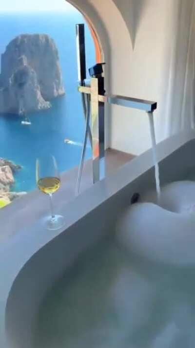 A bathroom with a beautiful view in Capri, Italy