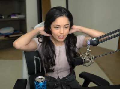 Rae playing with her hair and looking stunning