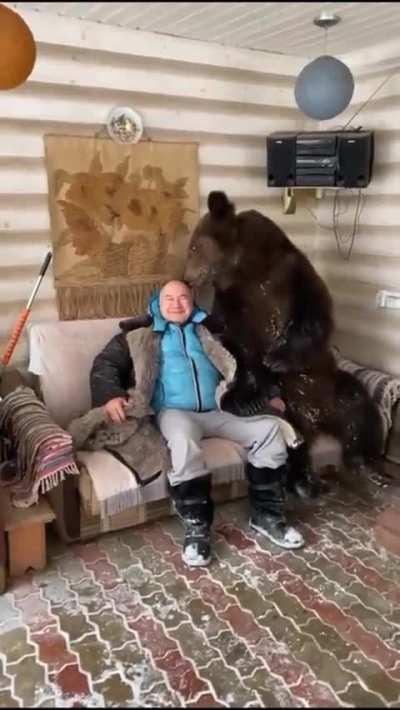 Another crazy bear befriending a Russian