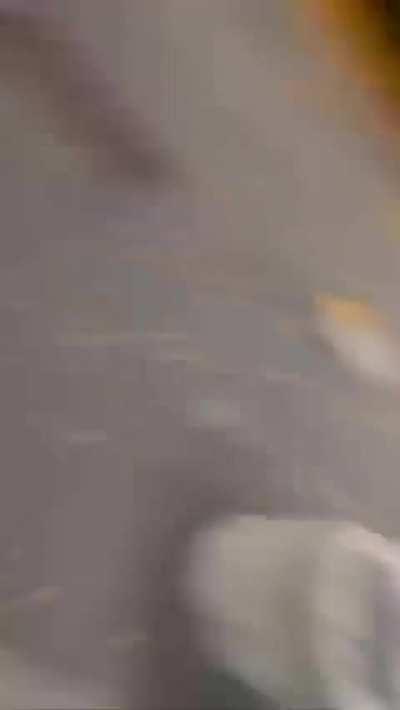 Woman freaks out on another woman taking down hostage posters