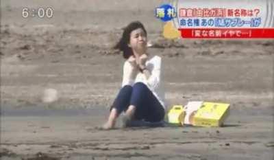 Hungry woman gets sandwich from bird