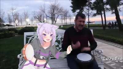 Okayu playing Ievan Polkka with Street drummer