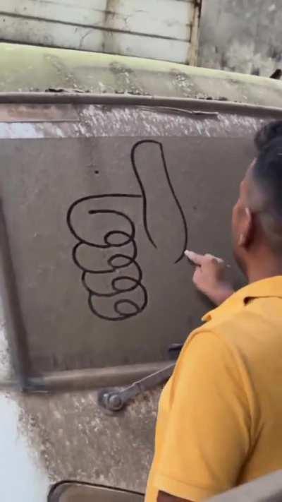 Thumbs Up on a dirty window