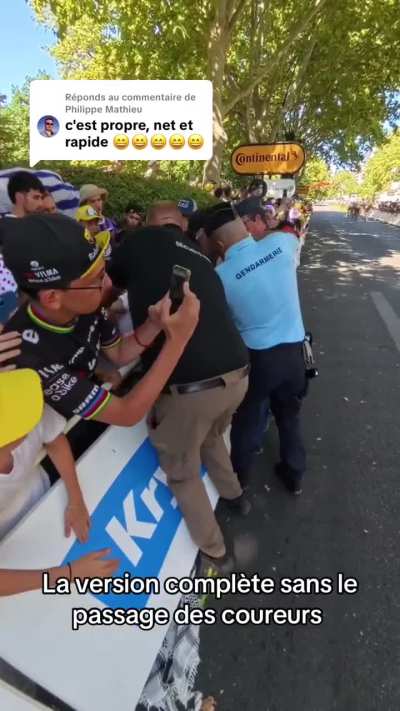 Pro-Palestine protester gets on the Tour de France tracks and the security reacts