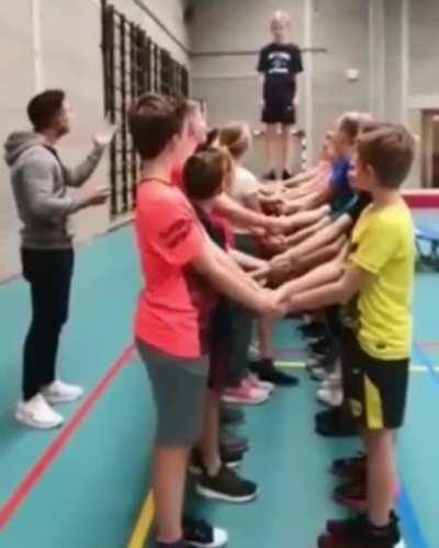 Kid Falls the Wrong Directions in Trust Exercise.
