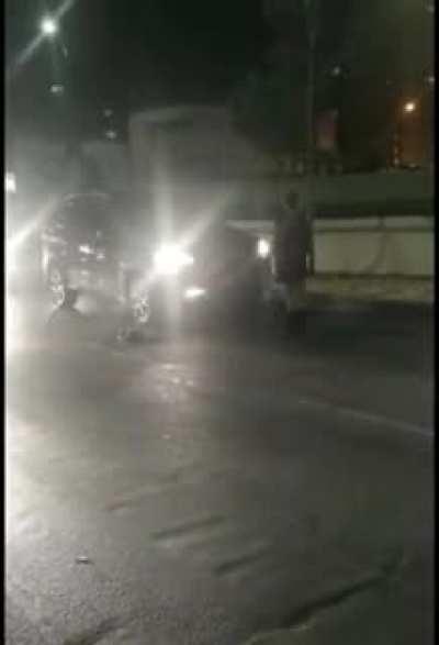 Dumbass protestor blocking the road gets hit by a fucking street cone stupid idiot