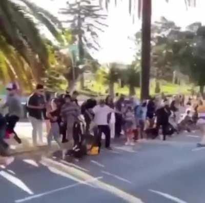 At least he looked cool without a helmet