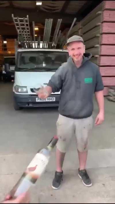 Alcohol brand owners pressure homeless man to drink a whole bottle of their alcohol.