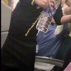 Lady trying to smoke on Plane