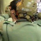 Police covered an arrestee's face to stop him from shouting his name for protection