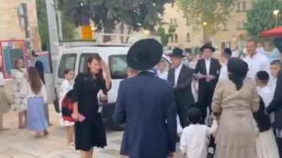 Children start attacking a Christian tourist in Jerusalem