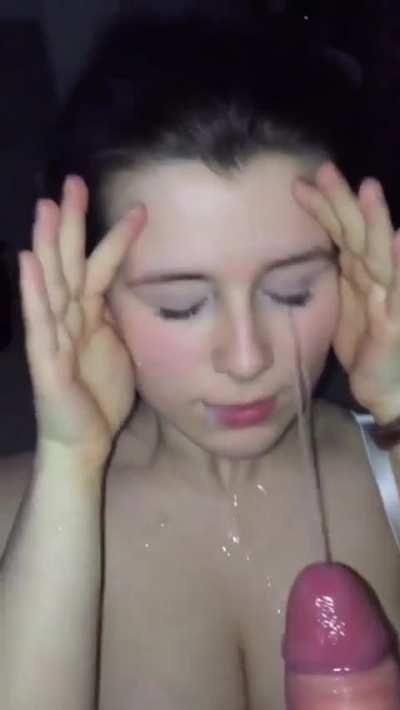 Huge facial on cute woman face.