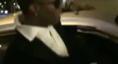 Juicy J on ecstasy stomping the roof of his Rolls-Royce