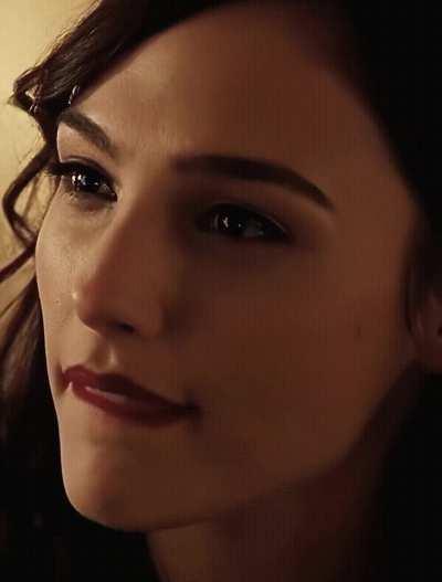 Gal Gadot grabs your cock as she gives you this look, telling you that she owns you. How would you react?