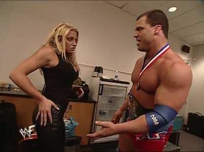 Trish Stratus nursing her butt after a match