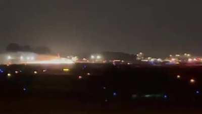 Another view of the FedEx 757 belly landing from the ramp crew.