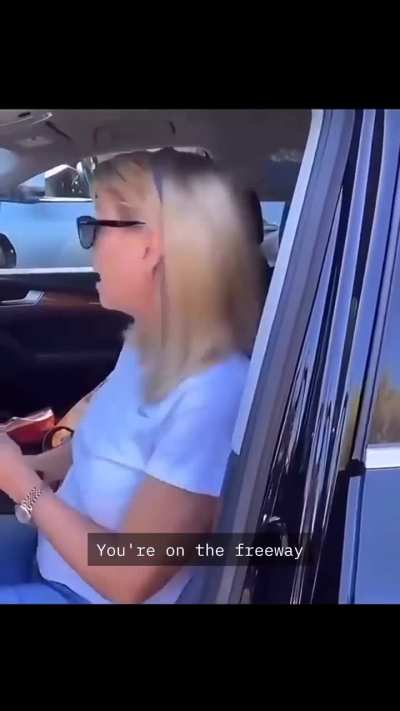 women driving a car with only 3 wheels