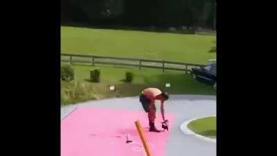 Craftsman with a nail gun follows the rhythm of the orchestra so as not to disturb them