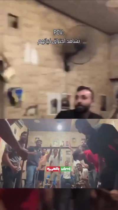 Inside a Lebanese coffee shop as people cheer watching Iranian missiles strike Israel