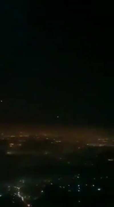 View of Iron Dome interceptions over Tel Aviv from a commercial flight just now (5/12/2021)