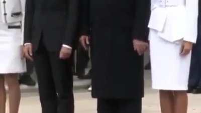 Try touch his wife's hand