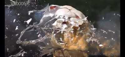 50 BMG API going through ballistics gel head