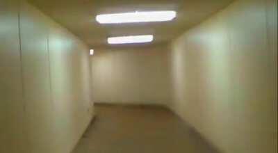 I was walking through the rooms and it began to turn into narrow hallways. I found a door that might lead to the next level. Should I go through?