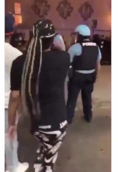 Chicago rioter breaks officer's nose