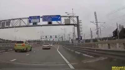 Guy gets cocky on a freeway