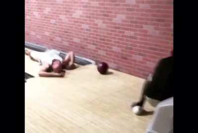 Getting hit in the head with bowling ball
