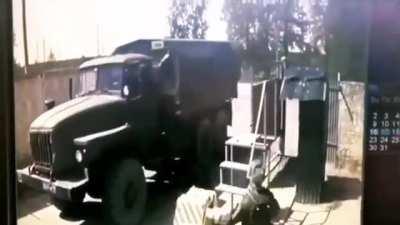 A Russian truck runs over their own soldier.