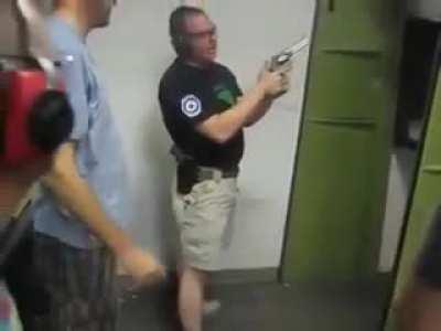 Dude's mind is blown by the firearms instructor. Almost literally.