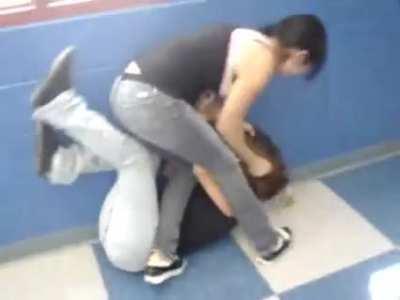 Girl pees herself in a school fight. Spectators laugh