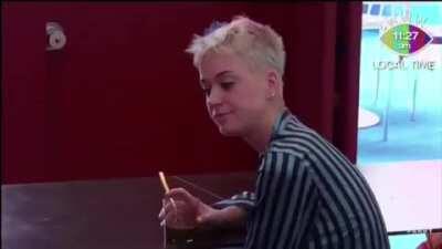 EXCLUSIVE FOOTAGE: Katy on the morning Folklore was announced, trying to decide how long to delay Smile so it can stand a chance at topping the Billboard 200