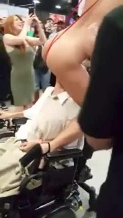 Adriana Chechik giving a disabled fan a taste and the time of his life