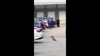 After stabbing 11 inside Walmart, suspect gets stopped by armed civilian in the parking lot