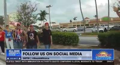 MAGA dumbfucks lined up for hours, awaiting the return of their orange messiah to Mar-A-Lago